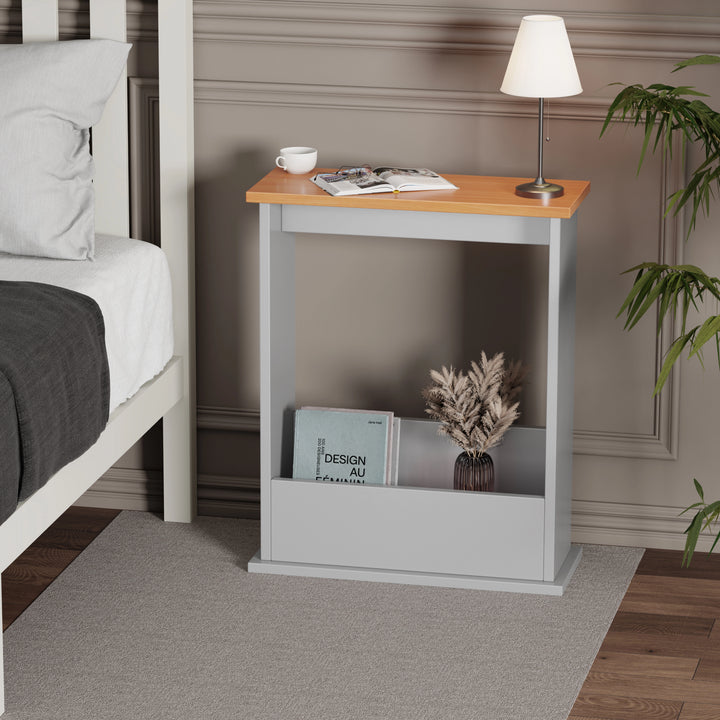 [Pine + Silver Grey] sofa end table in grey with oak top used as nightstand, books and lamp on top in minimal setting