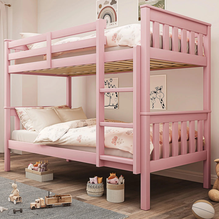 [pink] solid wood slatted bunk bed in soft pink childrens room with toys