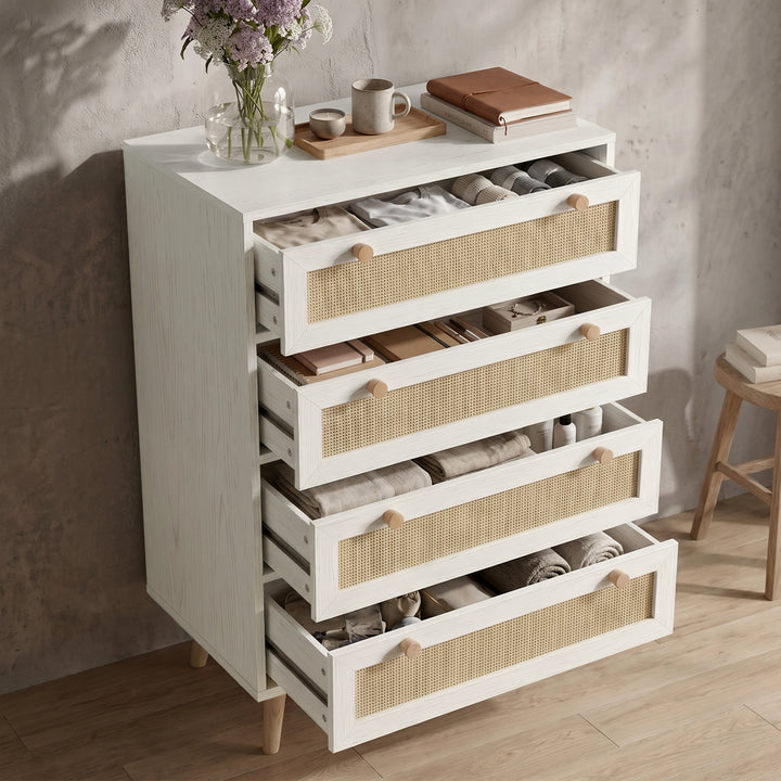 [White] Woven Rattan 4 Drawer Chest of Drawers, White displaying all four drawers fully extended with folded clothes and towels.