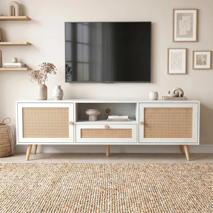 [White] Wovena Rattan TV Unit 160cm shown straight-on with ceramic vases, dried flowers, and gallery wall art above a wall-mounted television