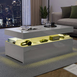 [Grey] Gloss coffee table at night with yellow LED mid shelf, city skyline visible through the window behind