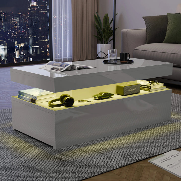[Grey] Gloss coffee table at night with yellow LED mid shelf, city skyline visible through the window behind