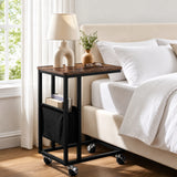 [Rustic] side table beside bed with rustic wood-effect top, side pouch storage and rolling caster wheels