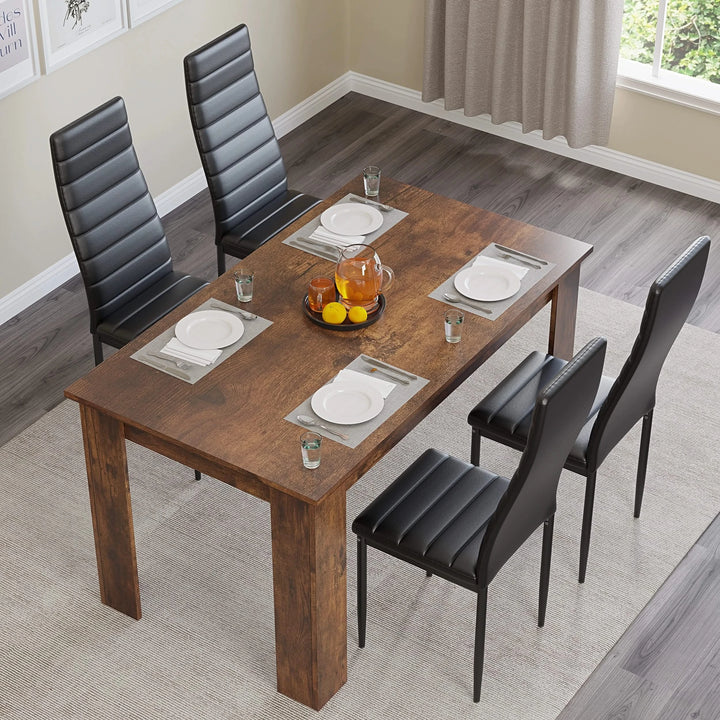 [4 Seater | Black] Top view rustic 112cm finish dining table laid with four settings and black chairs