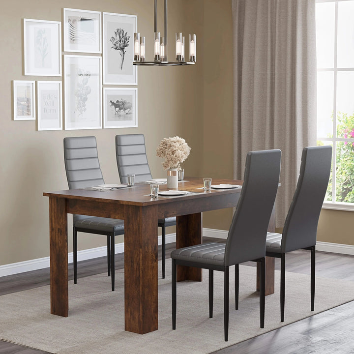 [4 Seater | Grey] Rustic table and four grey chairs in dining room with curtain and gallery wall