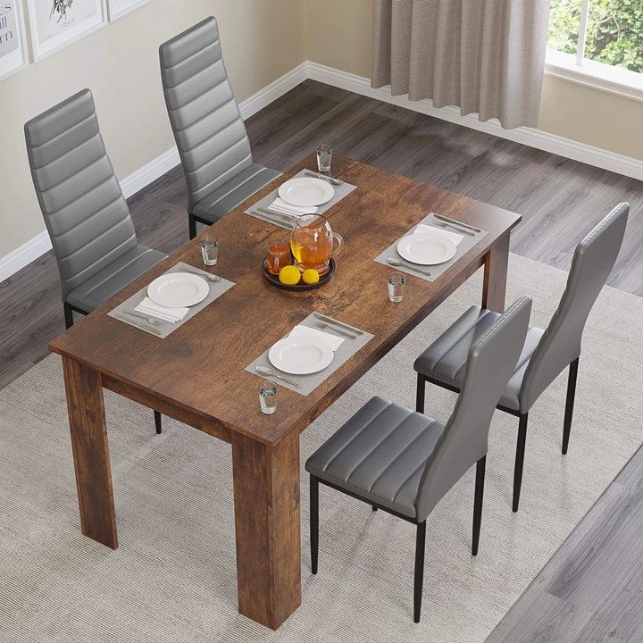 [4 Seater | Grey] Top view rustic 112cm finish dining table laid with four settings and grey chairs