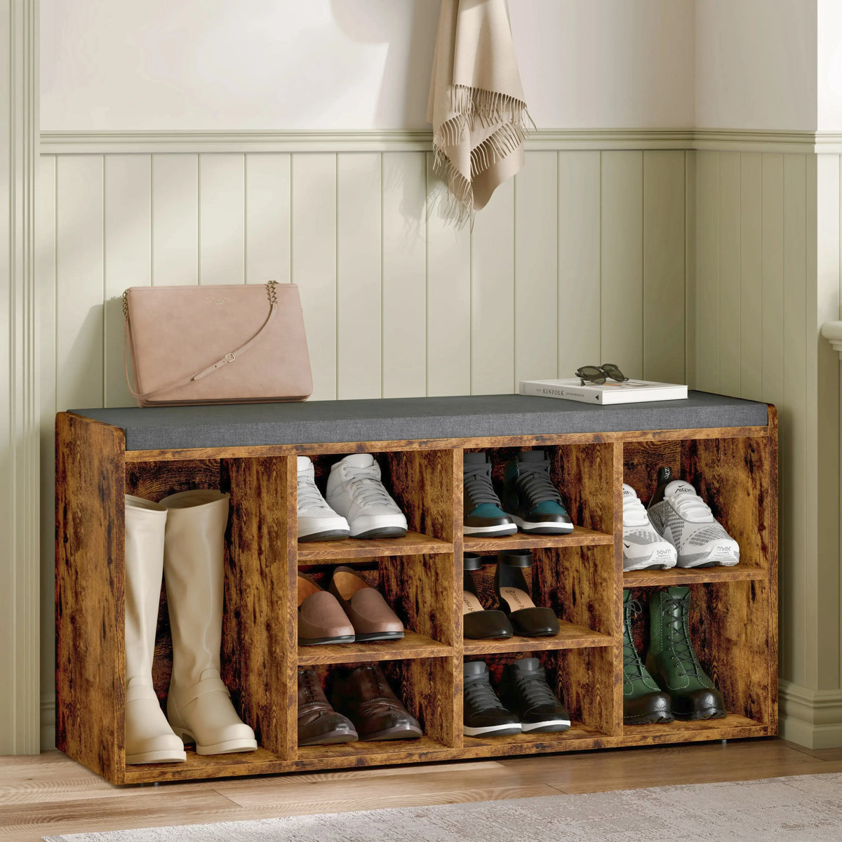 [Rustic] Rustic shoe storage bench angled view with handbag and books on grey padded seat