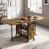 [Rustic] Kitchen & Dining Furniture Sets open drop leaf dining table with plates, cups, fruit, and centre storage.
