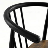 [Rustic] Torvi chair curved matte black metal backrest and armrest detail with rounded end cap and rustic seat