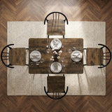 [Rustic] Torvi 4 seater dining set bird's-eye view fully laid with plates, cutlery, glasses and napkins on a textured rug over dark wooden floor