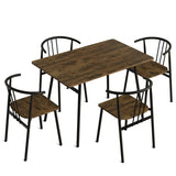 [Rustic] Torvi 4 seater dining set on white background showing dark rustic table with all four black metal spindle-back arm chairs arranged around it