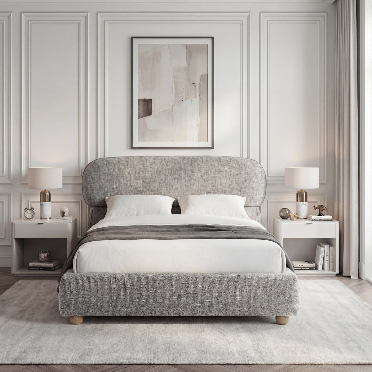 [Double | Grey] Front view of upholstered bed with pill-shaped headboard centred between matching nightstands with lamps