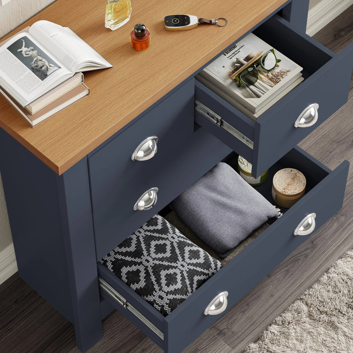 [Blue] Aerial view of blue Shaker chest, 2 top drawers extended showing magazines stored inside