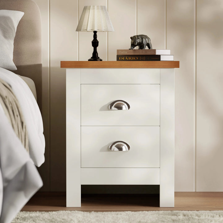 [White] Two drawer Shaker bedside in white with cup handles and oak top styled with table lamp