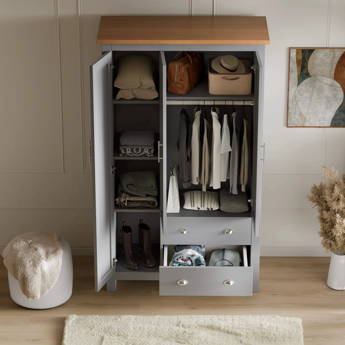 [Grey] Grey Shaker wardrobe open showing shelves bags hats above hanging rail part of bedroom furniture set
