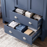 [Blue] Shaker Triple Wardrobe With Drawers And Shelves with two bottom drawers pulled open displaying