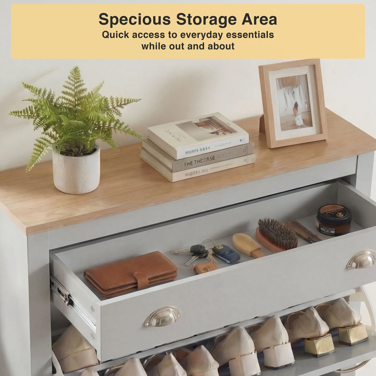 [Grey] Close-up of grey 2 door shoe cabinet drawer area with leather wallet and shoe-care tools laid inside