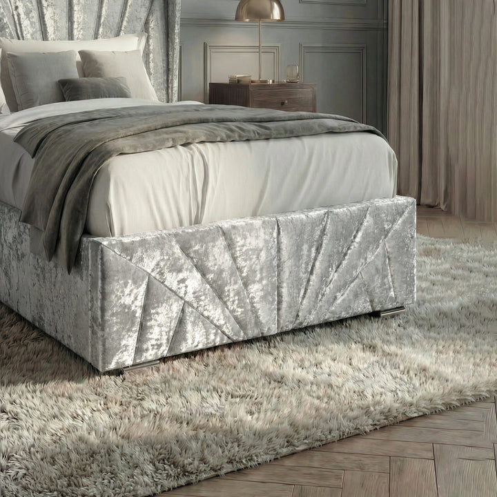 [Single | Silver] Footboard detail on Sunrise bed showing pleated velvet panels and metal support feet
