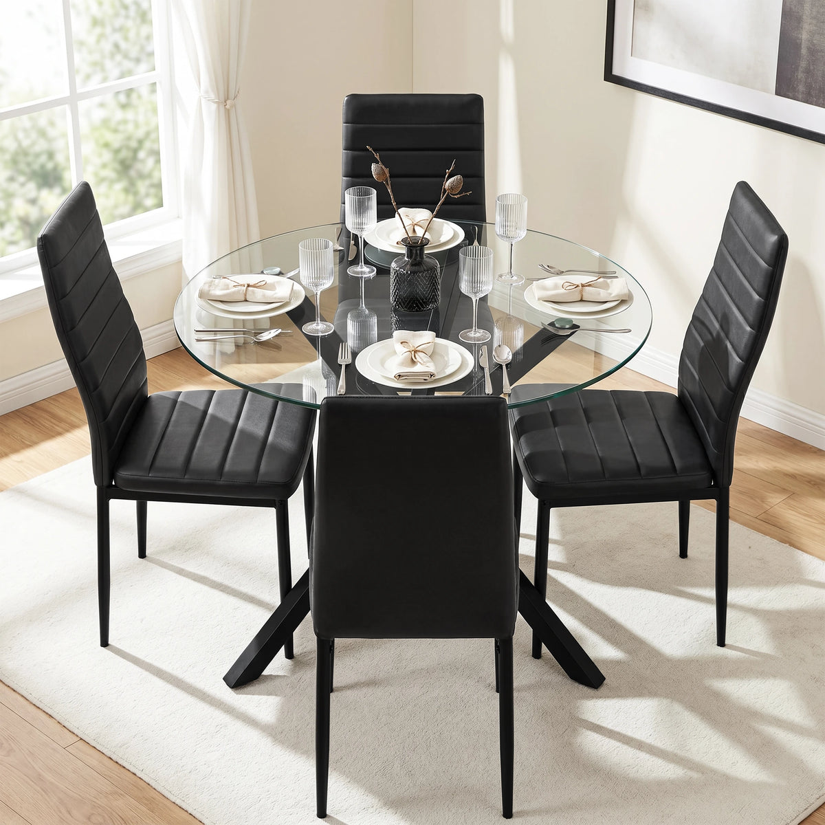 [Black] Skyra dining table set viewed from above with four chairs and place settings