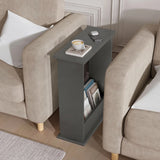 [Slate Grey] Narrow Side Table tucked snugly between two beige sofas with coffee cup, phone, earbuds, and books stored below
