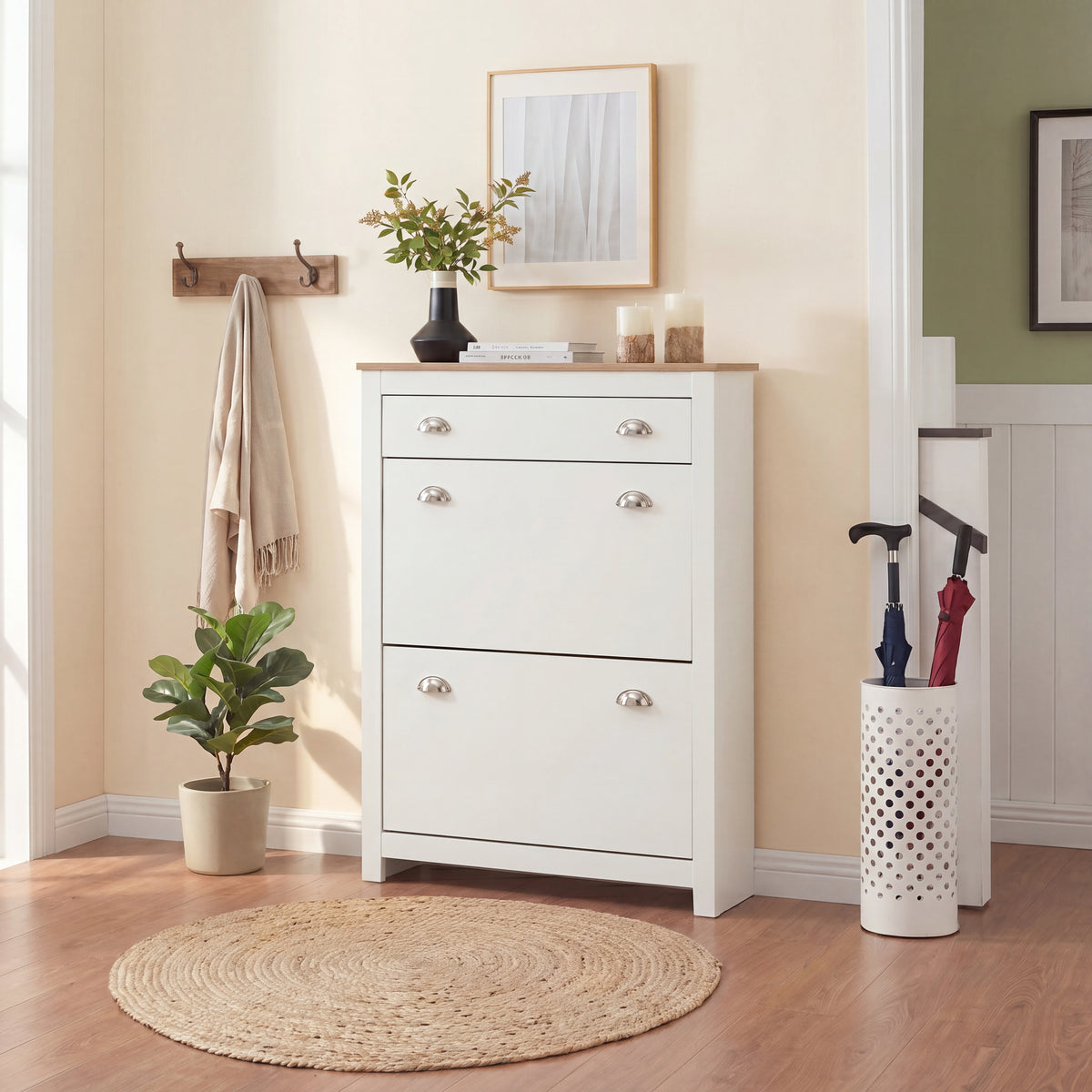 [White] Shoe Cabinet With Drawer featuring two closed tilt doors, a top drawer, and a wooden top in an entryway.