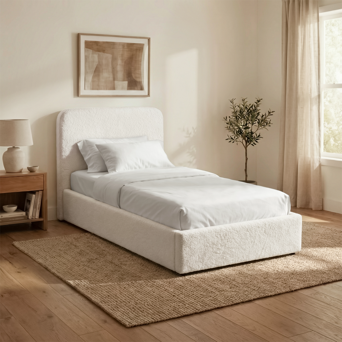[White | Single] Sofna boucle ottoman bed angled in room, white boucle single frame with curved headboard on wooden floor