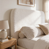[White | Small Double] Headboard detail of small double Sofna bed with gentle curve and ceramic lamp on adjacent nightstand
