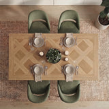 [4 Seater | Green] Top-down view of Aldridge oak parquet table with 4 green scoop chairs and green plant centerpiece.