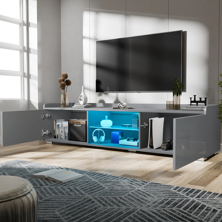 [Grey] Angled view of grey gloss TV unit, window left, TV mounted on white wall, blue LED shelves