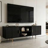 [Black] Black 180cm TV unit angled lifestyle with central open shelf in view and decorative items styled across top.
