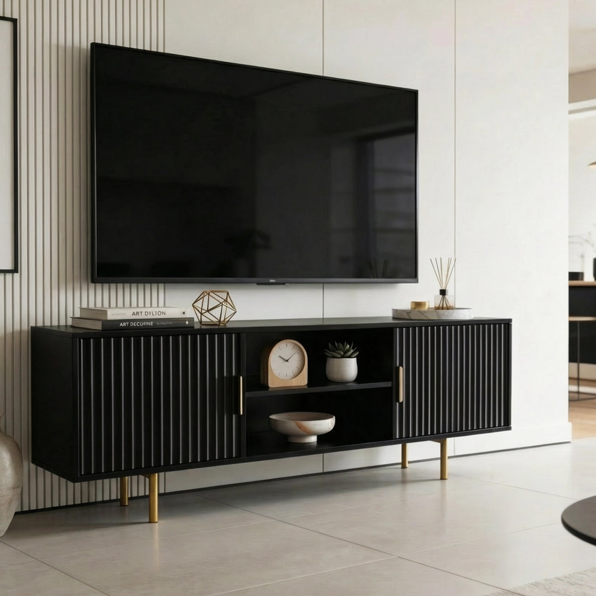 [Black] Black 180cm TV unit angled lifestyle with central open shelf in view and decorative items styled across top.