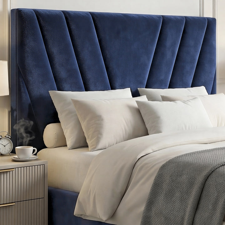 [King | Blue] channel-stitched navy velvet headboard on king ottoman bed with grey folded throw across lower bedding