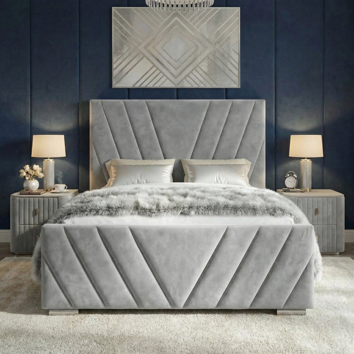 [King | Grey] Symmetrical view showing tall V-pattern headboard with white bedding and matching lamps on both sides