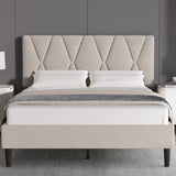 [King | Beige] Front view of velvet bed with diamond-tufted headboard and metal buttons against grey wall