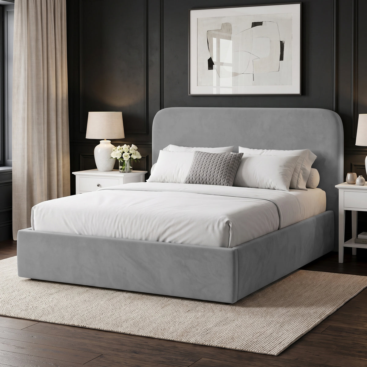 [Light Grey | King] upholstered bed frame with a matching headboard, dressed in white bedding and pillows, set in a modern bedroom with dark paneled walls, white nightstands, lamps, and a beige rug.