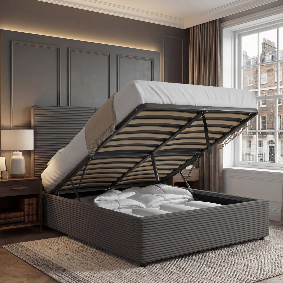 [King | Grey] Velvet ottoman bed base tilted up, king size, storage cavity full of bedding against panelling