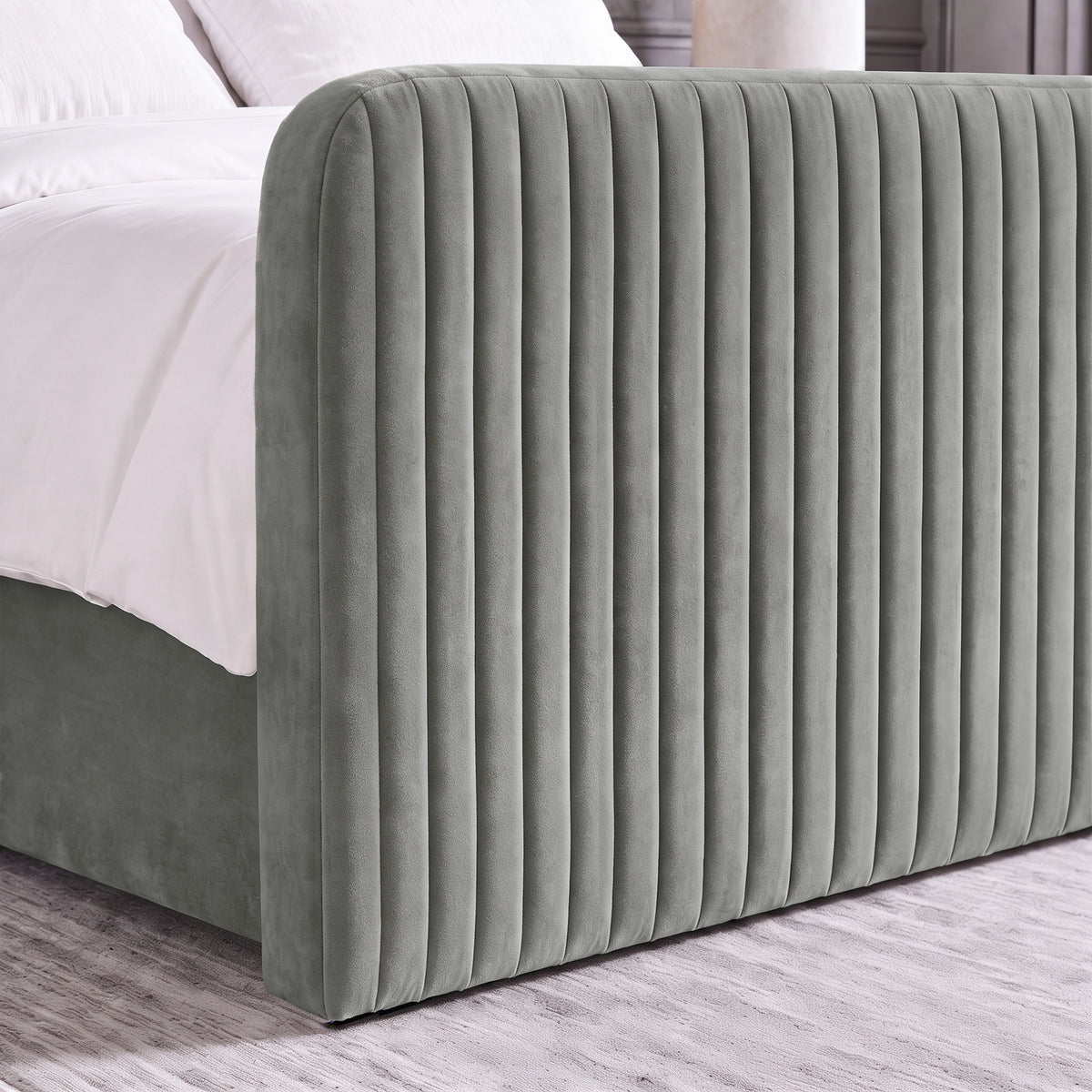 [Light Grey | Double] Close-up of 62cm tall padded footboard corner showing plush fabric and bed base detail
