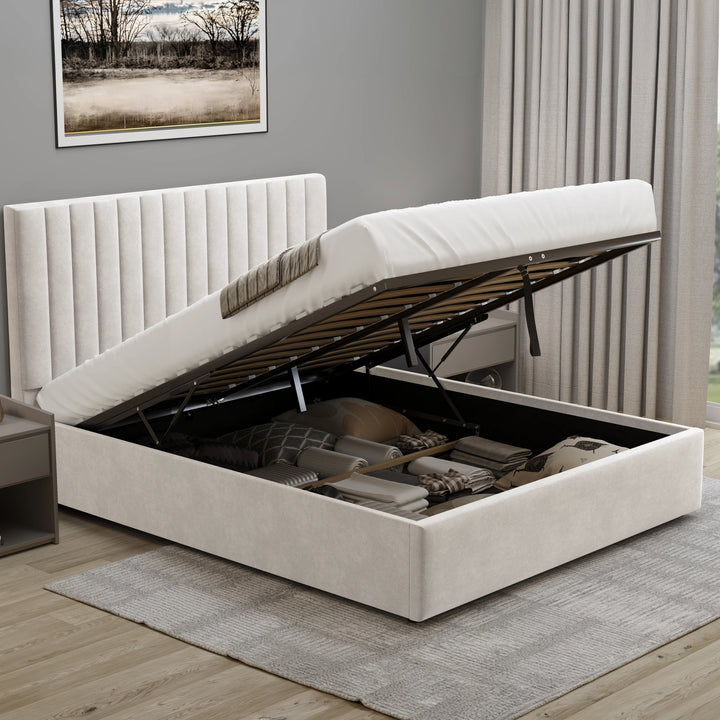 [Beige | Double] Gas-lift base raised on struts showing slatted wooden frame with folded white pillows and beige linens