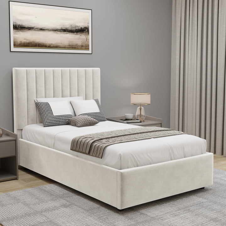[Beige | Single] vertical channel velvet ottoman bed with fluted headboard in bright room with white nightstands