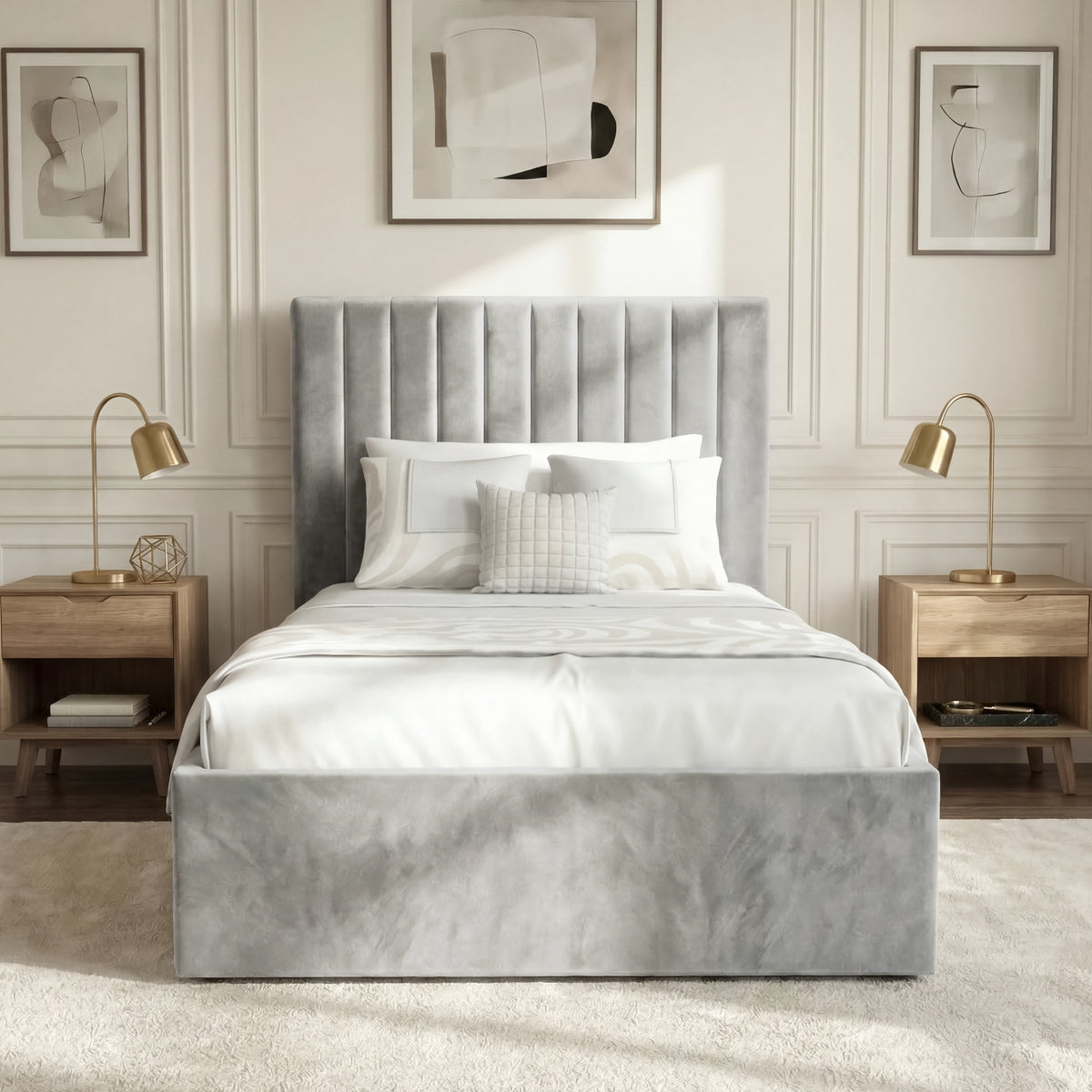 [Light Grey | Single] Front view vertical channel ottoman bed between wood nightstands with brass-stem lamps and art