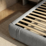 [Double | Grey] Bed frame base detail with wooden slats and rounded padded footboard corner on jute rug