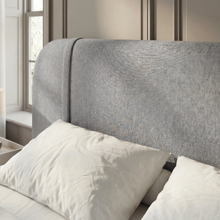 [King | Grey] Headboard detail with gentle curved top edge and padded wingback shape against panelled wall