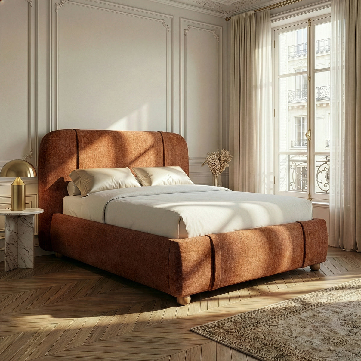 [King | Orange] Upholstered bed from the side with marble side table and brass dome lamp beside French window