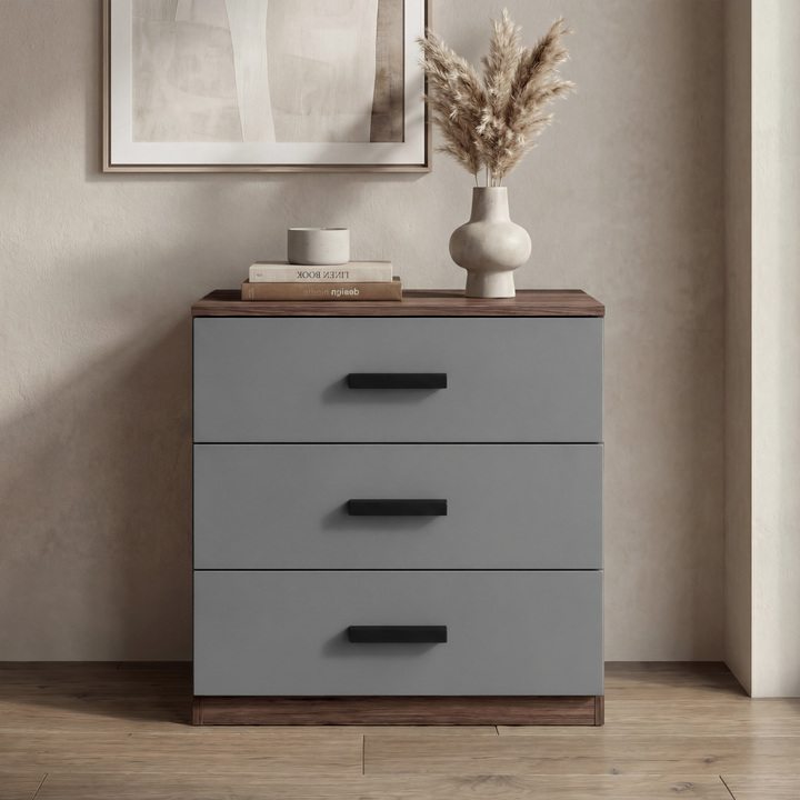 [Walnut] Front elevation of walnut grey bedroom drawers against neutral wall with clean dual tone finish
