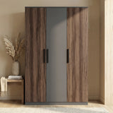 [Walnut] triple door wardrobe front view with dual tone finish and centered black handles placed against a wall in a bright lit room