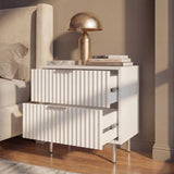 [White] Side view of white nightstand with flutrina two drawer fronts and slim golden metal pulls