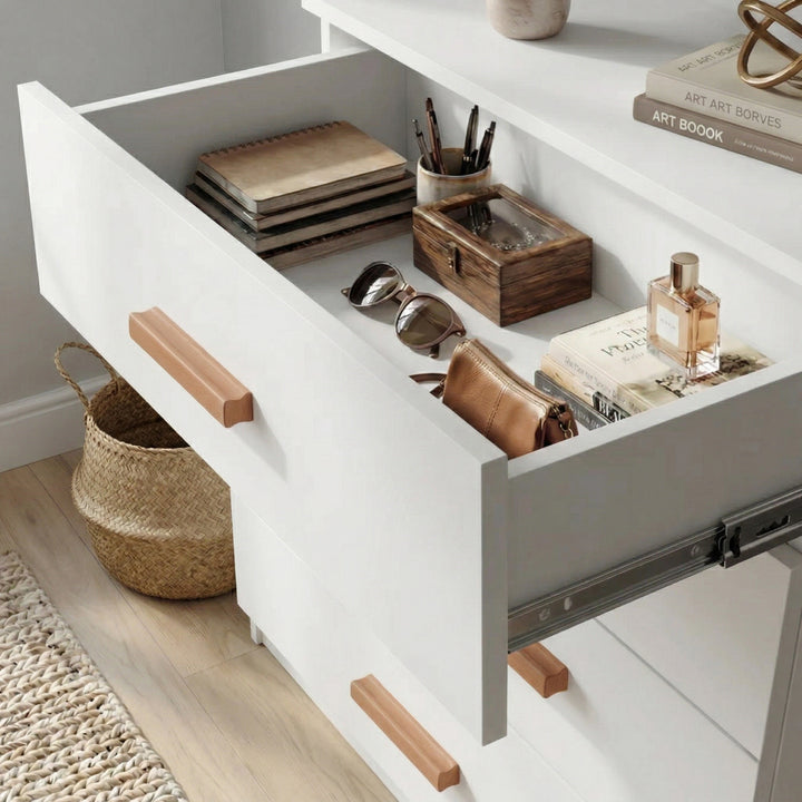 [White] Close view of white chest top drawer interior showing organised storage space and smooth inner panels