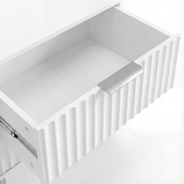 [White] Interior view of white bedside drawer with smooth painted finish and practical storage depth