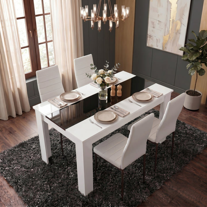 [4 Seater | White] White & Black Gloss 4-6 Seater Dining Table viewed from an elevated angle with four white chairs and neutral place settings in a dark-walled dining room