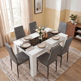 [6 Seater | Grey] White & Black Gloss 4-6 Seater Dining Table viewed from above with six grey faux-leather chairs and six neutral place settings on a woven rug